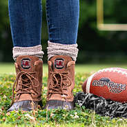 south carolina gamecocks duck boots on football field