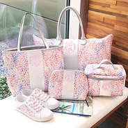 monogrammed watercolor collection on bench