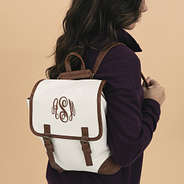 girl carrying ivory backpack purse new