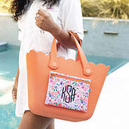 personalized coral floral beach bag at pool