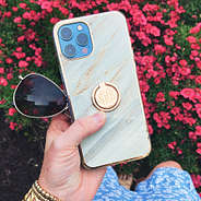 marble phone case with monogrammed phone ring and sunglasses