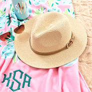 tan fedora with pineapple monogrammed beach towel and monogrammed slim can koolie