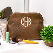 brown metallic leopard cosmetic case in bathroom