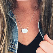 monogram octagon necklace with jean jacket