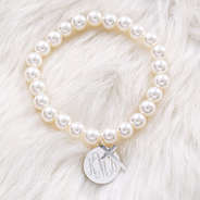 pearl bracelet with monogrammed disc and cross
