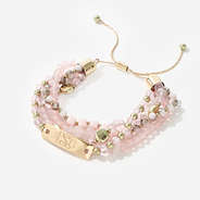 pink beaded bracelet stack