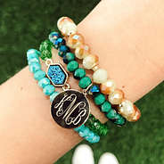 green and blue monogrammed bracelet stack