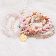 boho bracelet set on fuzzy rug