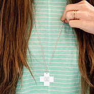 silver monogrammed cross pendant with mint top