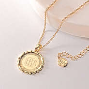 gold monogrammed medallion necklace with chain extender
