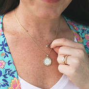 gold monogrammed necklace with medallion pendant