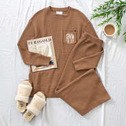 flatlay of waffle crewneck sweatshirt with pants