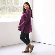 side view of model wearing wine sweatshirt