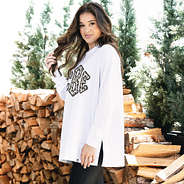 girl wearing monogrammed crewneck with leopard design