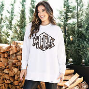 girl wearing personalized crewneck with cowhide design