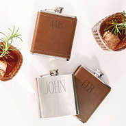 leather wrapped and silver flasks
