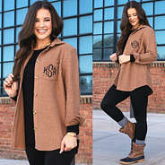 monogrammed corded shacket with black shirt, leggings and duck boots