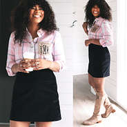black skirt with pink plaid shirt tucked in