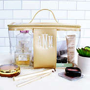 monogrammed clear train case in bathroom