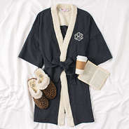 Monogrammed Sherpa Robe with book on bed