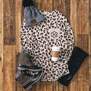 cute leopard top with duck boots and beanie