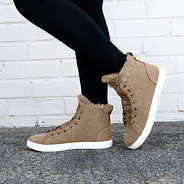 side view of tan sneakers