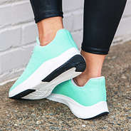 back of monogrammed mint sneakers
