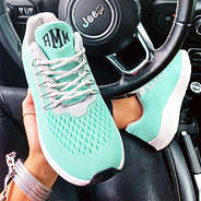 monogrammed mint sneakers in car