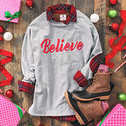 believe sweatshirt layered with holiday plaid tunic