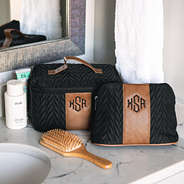 black and brown quilted travel train case with makeup bag