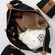 inside black quilted travel bag