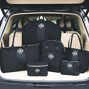 monogrammed quilted travel bag collection in car