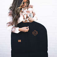 black quilted garment bag zipper