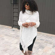 Model wearing Poncho Sweater in Ivory
