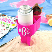 monogrammed sand buddy in sand and towel