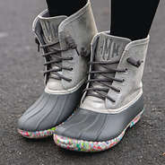 confetti duck boots on pavement