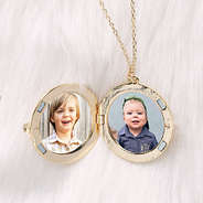 photos of kids in gold monogrammed locket necklace