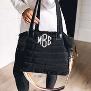 black monogrammed quilted crossbody