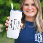 white tumbler with silver monogram