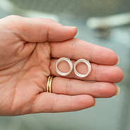 rope circle earrings in hand