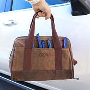 man holding personalized tool bag