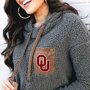 detail of oklahoma logo on sherpa hoodie
