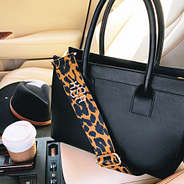 leopard monogrammed strap on sophie handbag