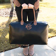 monogrammed overnighter with sturdy drop handles