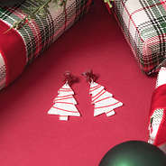 Resin Christmas Tree Earrings in White on Red Wrapping Paper