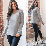 vneck sweatshirt with leggings and classic sneakers