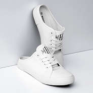 white slide on sneaker studio shot