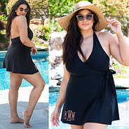 black monogrammed swim dress at the pool