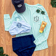Monogrammed Mint Sun Shirt outfit with hat and swim top and bottom.