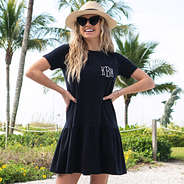 black ruffle dress on beach